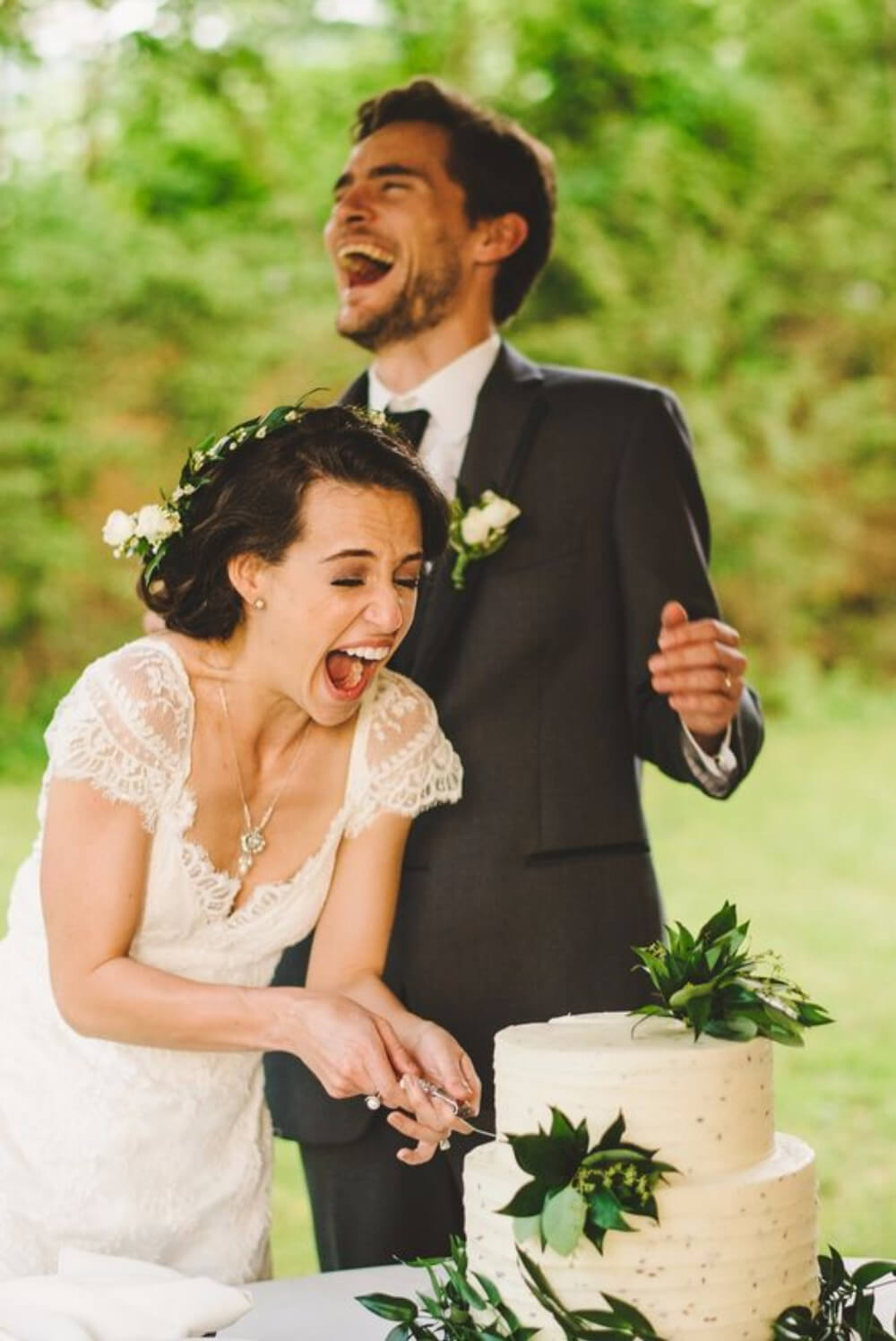 Bride and groom cutting cake