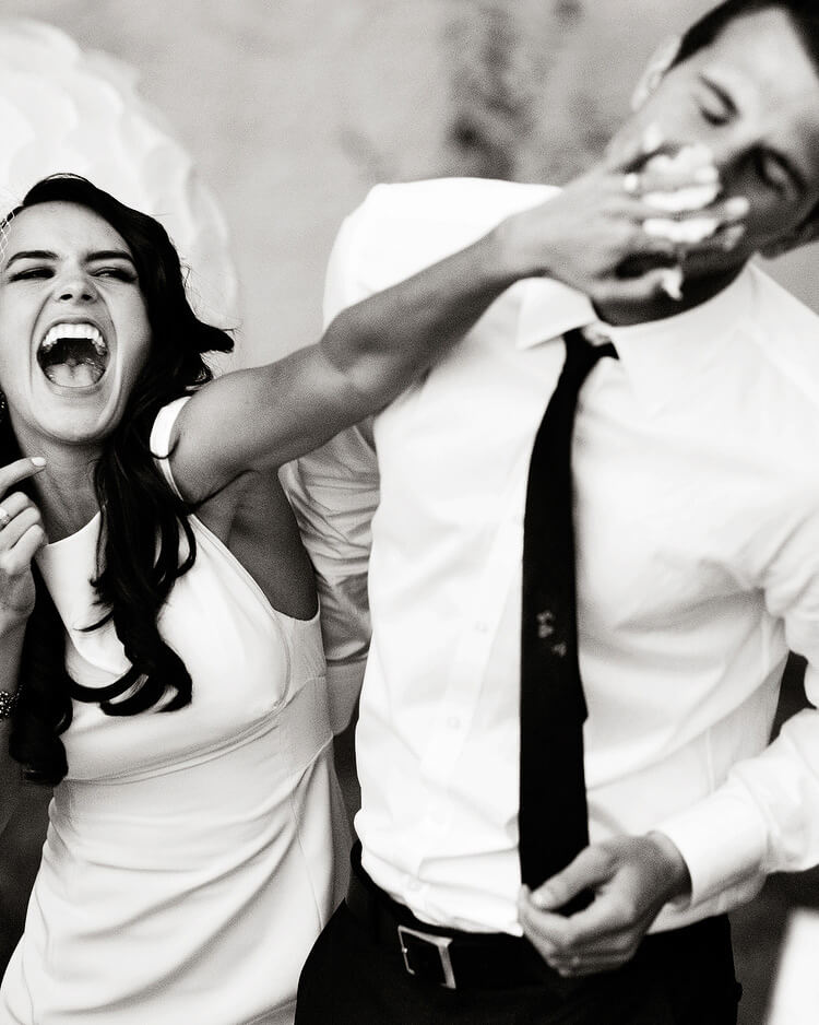 Bride and groom eating cake