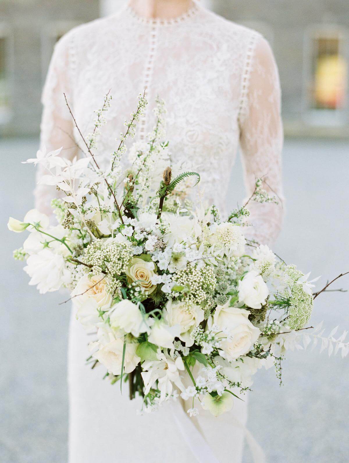 bride holding flowers