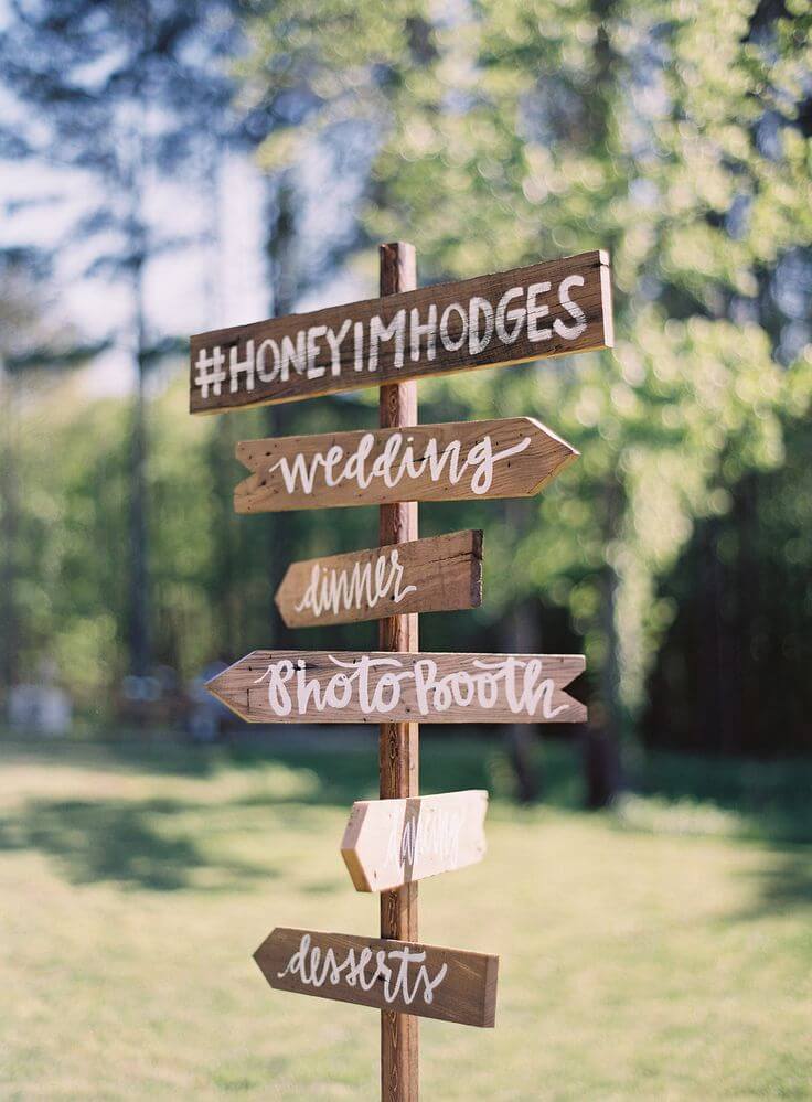 Wedding directional sign with wedding hashtag