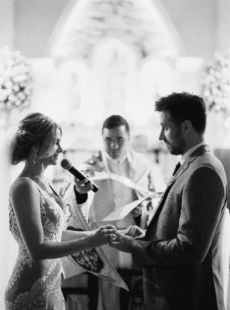 bride and groom reciting religious wedding vows