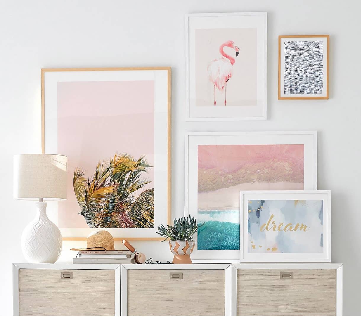 art prints resting on table and hanging on wall