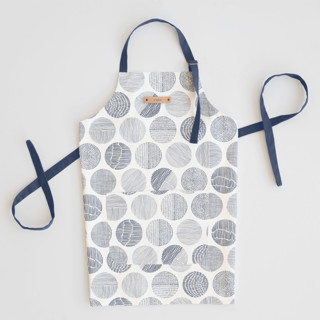 This is a navy aprons by Sabrin Deirani called minimalist circles in standard