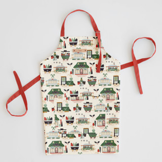 This is a mistletoe aprons by Beth Schneider called jolly train in standard