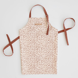 This is a cinnamon aprons by Teju Reval called enchanted holiday in standard