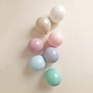 This is a multicolorassorted-colors party decorations by PopFestCo called pastel rainbow balloon garland premium kit (8-10ft) in standard