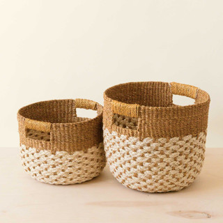 This is a gold accent pieces by LIKHA called natural + golden brown round bottom basket, nested set of 2 in standard