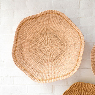 This is a natural accent pieces by LIKHA called large scallop wall basket 18" in standard