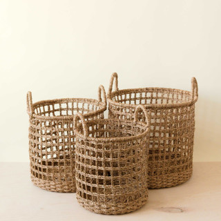 This is a natural accent pieces by LIKHA called seagrass rope open weave cylinder basket with handles, nested set of 3 in standard