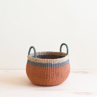 This is a orange accent pieces by LIKHA called coral bulge basket in standard