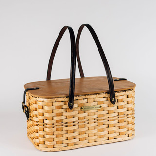 This is a natural accent pieces by Millstream Home called the linda sue picnic basket in standard