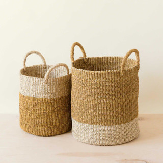 This is a yellow accent pieces by LIKHA called mustard cylinder basket with handles, nested set of 2 in standard