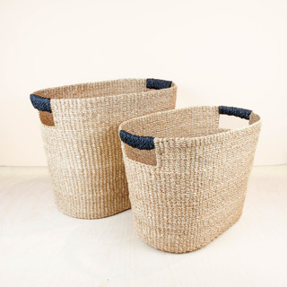 This is a black accent pieces by LIKHA called black rounded oval basket, set of 2 in standard