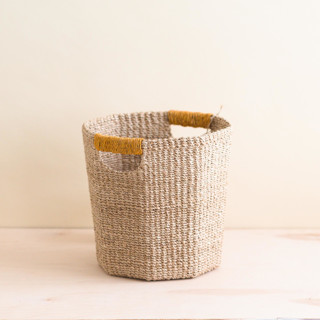 This is a yellow accent pieces by LIKHA called natural + mustard yellow octagon basket in standard