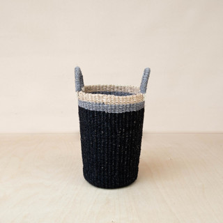This is a black accent pieces by LIKHA called black cylinder vase basket in standard