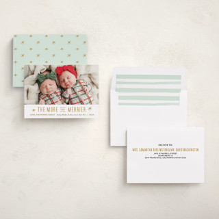 This is a golden babys first christmas with standard by Carolyn MacLaren called the more, the merrier printing on recycled smooth signature in standard
