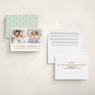 This is a golden babys first christmas with standard by Carolyn MacLaren called the more, the merrier printing on recycled smooth signature in standard