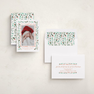 This is a tangerine babys first christmas with standard by Alethea and Ruth called merry little christmas greenery printing on recycled smooth signature in standard