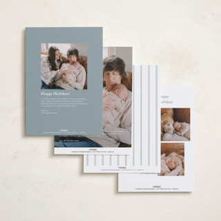 This is a fog babys first christmas with standard by Everett Paper Goods called merrier this year printing on recycled smooth signature in standard