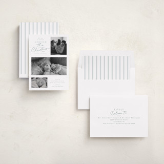 This is a fog babys first christmas with standard by Everett Paper Goods called merrier this year printing on recycled smooth signature in standard