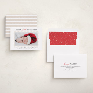 This is a coal babys first christmas with standard by Hooray Creative called merry scallop printing on recycled smooth signature in standard