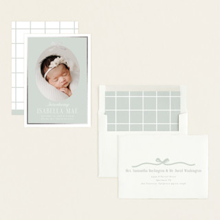 This is a aloe foil stamped birth announcements with foil pressed by Erin German called tied with a bow printing on recycled smooth signature in standard