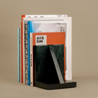 This is a brown accent pieces by Algo Studio called tope para libros green bookend in standard