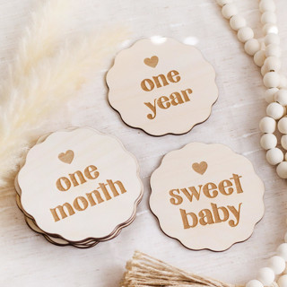 This is a beige nursery decor by The Print Pantry Team called wavy baby milestone signs in standard