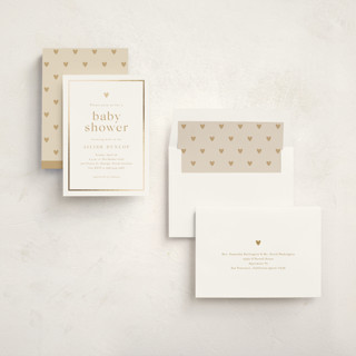This is a golden foil stamped baby shower invitations with foil pressed by Stacey Meacham called heartbeat printing on signature in standard