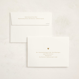This is a golden foil stamped baby shower invitations with foil pressed by Stacey Meacham called heartbeat printing on signature in standard