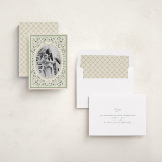 This is a evergreen photo christmas cards with standard by Sabrin Deirani called peaceful blooms in blue printing on recycled smooth signature in standard