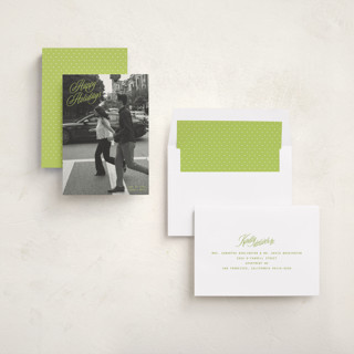 This is a mistletoe glow photo christmas cards with standard by JoAnn Jinks called neon vintage printing on recycled smooth signature in standard