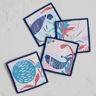 This is a navy table linens by Morgan Ramberg called fish in the sea in standard