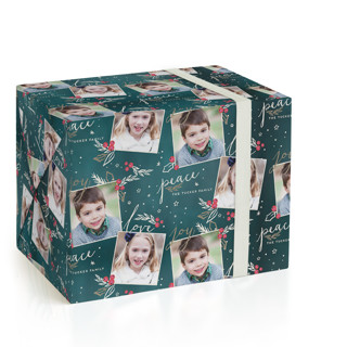 This is a teal wrapping paper with standard by Petra Kern called berry love peace joy printing on wrapping paper in standard