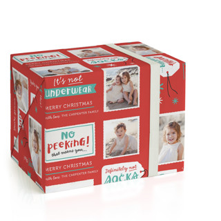 This is a stocking wrapping paper with standard by Kelly Nasuta called no peeking printing on wrapping paper in standard