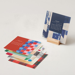 This is a patterned photo calendars by Multiple Artists called pattern play: 2025 desk calendar in desk