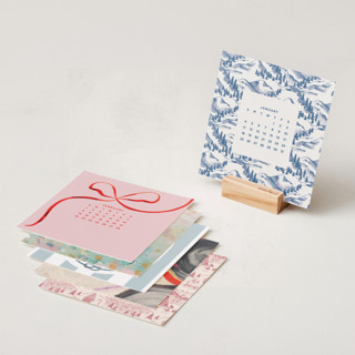 This is a festive photo calendars by Multiple Artists called year of art: 2026 minted desk calendar in standard