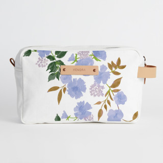 This is a periwinkle dopp kit by Erin German called botanical cascade - peri in standard
