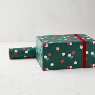 This is a festive wrapping paper by Pixel and Hank called merry dots in standard