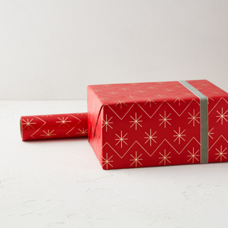 This is a peppermint wrapping paper by Roseanne Kenny called traditional red and gold in standard