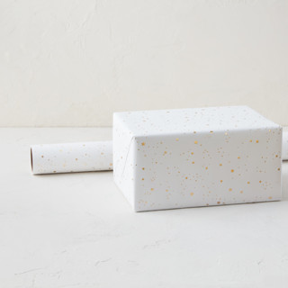 This is a cloud wrapping paper by Jenna Holcomb called confetti stars in standard