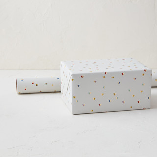 This is a vanilla wrapping paper by Sumak Studio called tiny hearts in standard