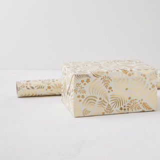 This is a gilded wrapping paper by Mercedes called gold ferns in standard