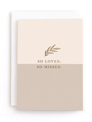 This is a beige tbd by Olivia Raufman called so loved in greeting cards
