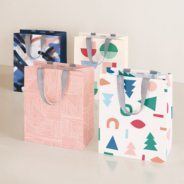 This is a blue wrapping paper by Multiple Artists called Pop Holiday.