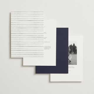 This is a navy wedding invitations with foil pressed by Sarah Brown called peaks printing on signature in grand