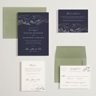 This is a navy wedding invitations with foil pressed by Sarah Brown called peaks printing on signature in grand