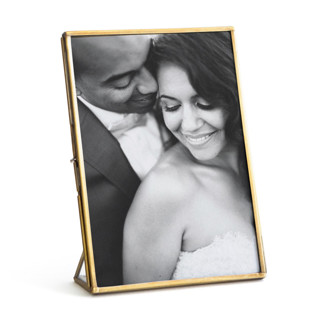 This is a gold place card holders by Minted called brass in standard