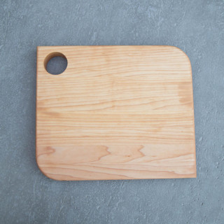 This is a natural tableware by Block and Bowl called maple cutting board in standard