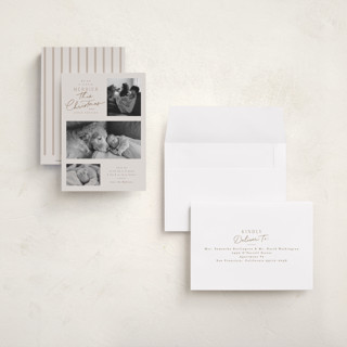 This is a toffee babys first christmas with standard by Everett Paper Goods called merrier this year printing on recycled smooth signature in petite